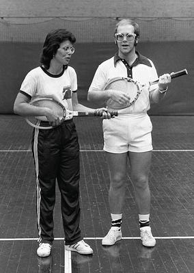 PHOTOGRAPHED BY TERRY O'NEILL
American top tennis player Bille Jean King with Elton John during Wimbledon, June 1974.
