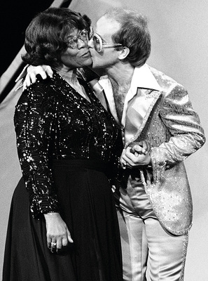 PHOTOGRAPHED BY TERRY O'NEILL
Elton John and Ella Fitzgerald at the Grammys, late 1970s
