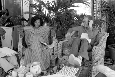 PHOTOGRAPHED BY TERRY O'NEILL
British pop singer Elton John and American actress and singer Diana Ross relax ahead of them hosting the Rock Music Awards, 1975.
