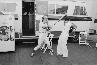 PHOTOGRAPHED BY TERRY O'NEILL
British pop singer Elton John and American tennis champion Billie Jean King backstage at Dodger Stadium, October 1975.
