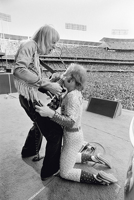 PHOTOGRAPHED BY TERRY O'NEILL
“Davey Johnstone has been Elton’s guitarist since the early 1970s – and is still performing with him to this very day! Here they are at Dodger Stadium, a true rock-and-roll moment.” -Terry O’Neill
