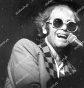 elton-john-singer-elton-john-singing-at-a-charity-concert-shutterstock-editorial-3317396a_-_david_thorpe_28129.jpg