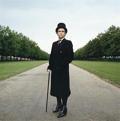 “This is an outtake from the album cover shoot for A Single Man, released in 1978. We did this shoot on the Long Walk in Windsor Great Park in Berkshire. We decided to go back to the classic style. The back of the album was single, the same shot but from behind.”
- Terry O’Neill
