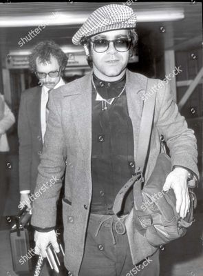 elton-john-singer-elton-john-at-heathrow-shutterstock-editorial-3317392a.jpg