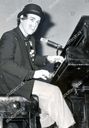 sir-elton-john-singer-and-musician-1978-sir-elton-john-abandoned-his-flat-hat-for-a-new-style-headgear-bowler-hat-when-he-played-at-the-london-hilton-shutterstock-editorial-892631a.jpg